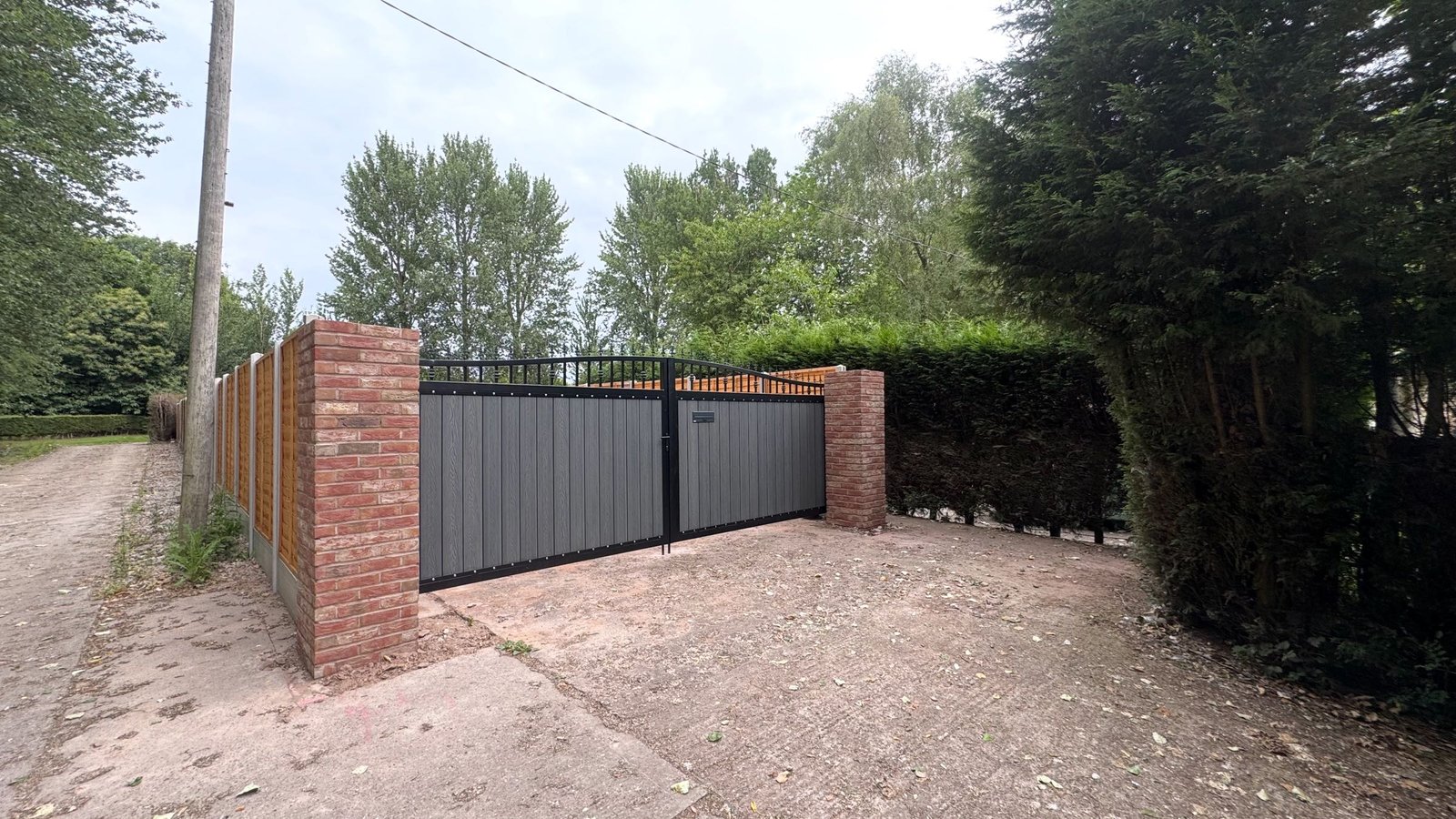 Gates With Brick Pillars image 1