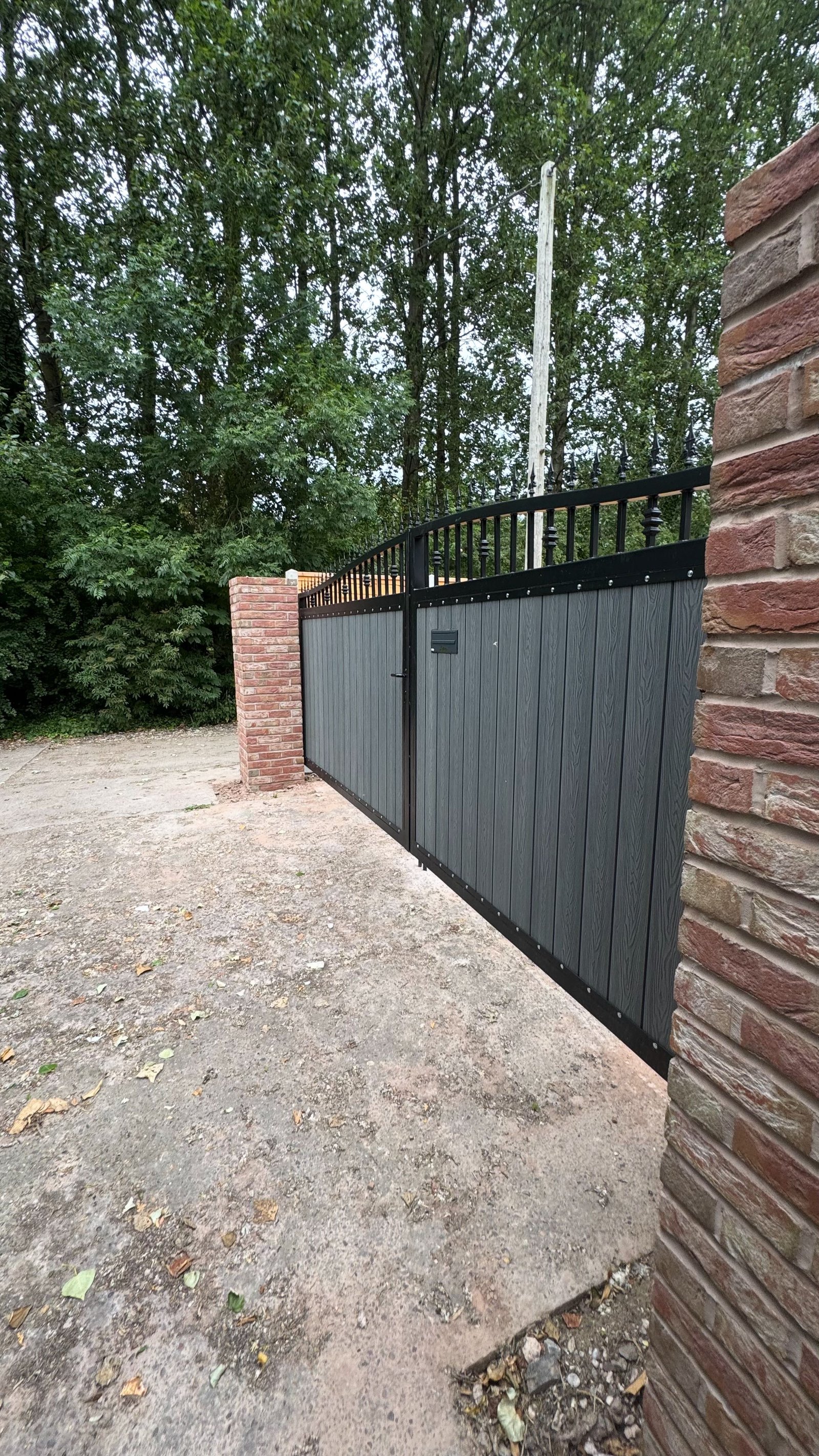 Gates With Brick Pillars image 3