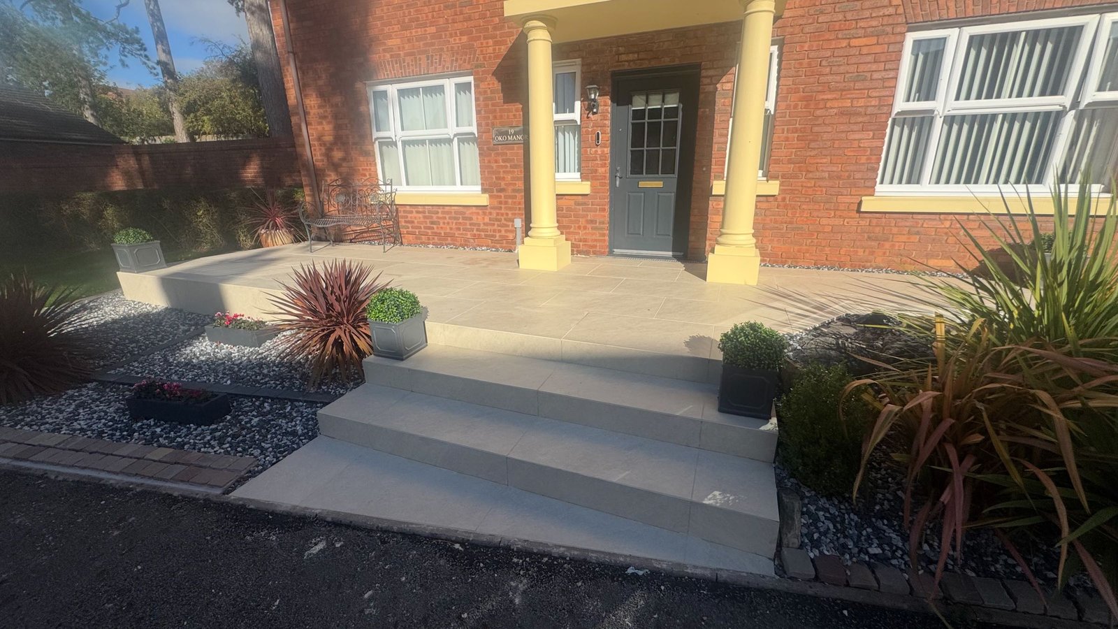 Front Porcelain Patio With Mitred Steps image 1
